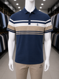 A navy blue short-sleeve polo shirt with beige and white horizontal stripes across the chest and shoulders.