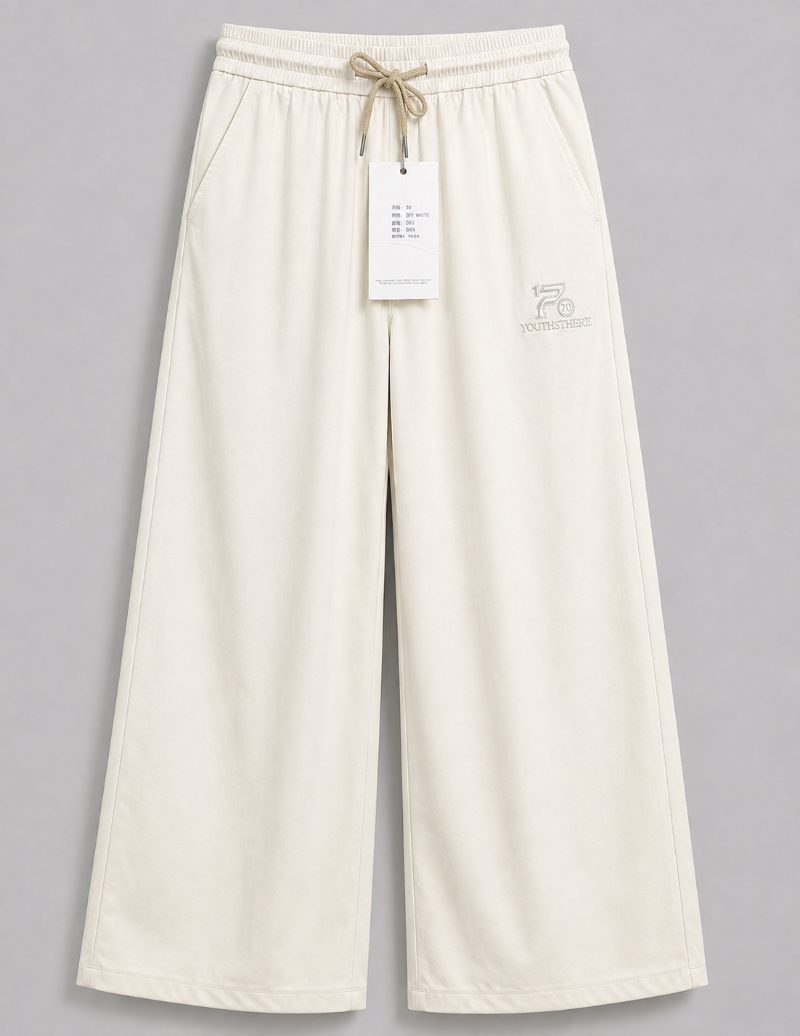 Baggy Trouser 100% imported cotton fabric, premium quality stitching, and deep side pockets in off White Colours.