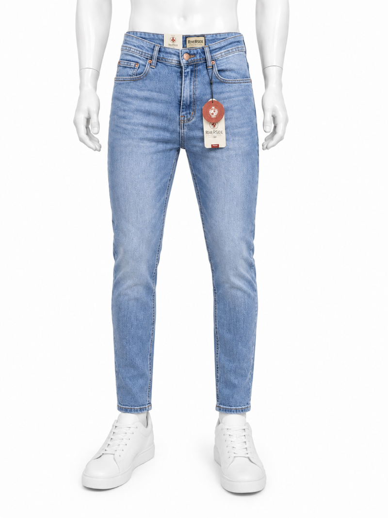 Light blue Regular-fit denim jeans displayed on a white mannequin lower body with white sneakers against a plain white background.