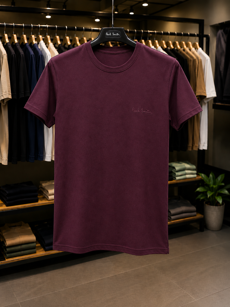 A Mehroon Colour t-shirt with 'Paul Smith' in 100% Cotton.